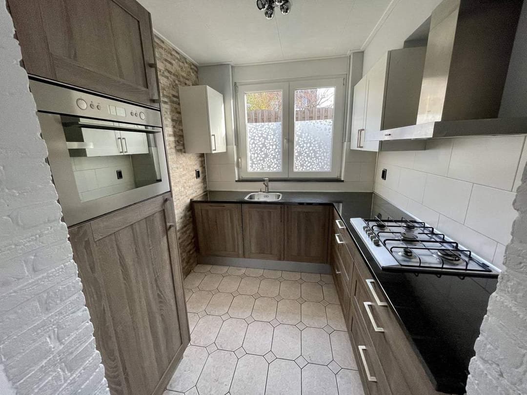 Maison mitoyenne familiale avec jardin, garage et espace de vie au grenier à Heerlen - Siluurstraat